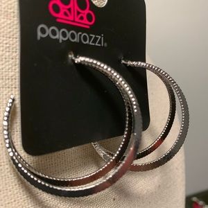 Small silver hoop earrings.